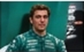 A driver in the paddock before a session